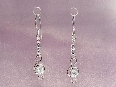 Silver treble clef music note earrings