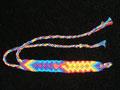 Friendship bracelet with red music quaver