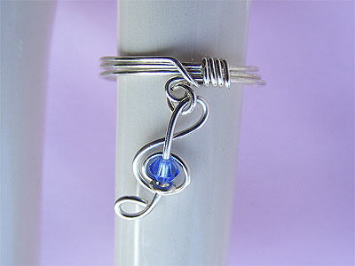 Blue Swarovski music themed ring