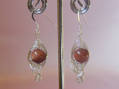 Brown golden sand stone music themed earrings