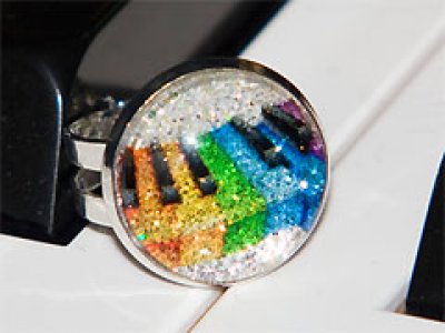 Colourful piano keyboard sparkling ring