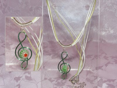 Green lampwork glass handmade treble clef necklace