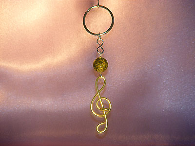 Music themed yellow treble clef key ring
