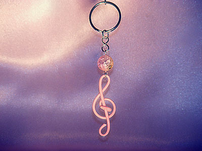 Pink treble clef music note key ring