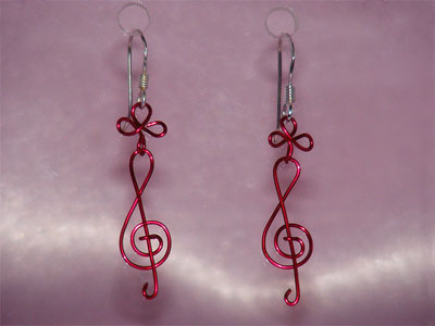 Red treble clef music note clover earrings