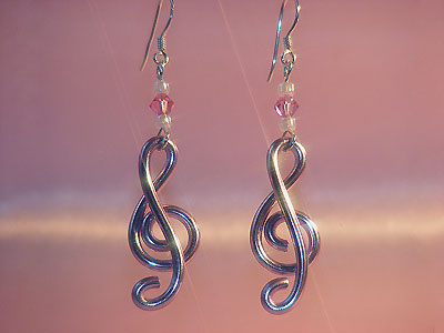 Rose pink treble clef music note earrings