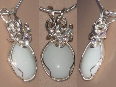 Wire wrapped Swarovski hand cut opal necklace