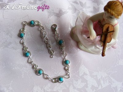 Blue turquoise treble clef music themed bracelet