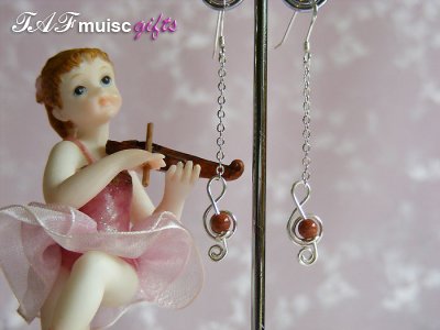 Gold sandstone treble clef music themed earrings