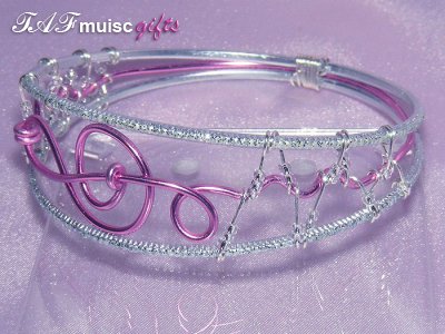 Music themed pink treble clef bangle