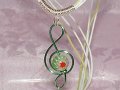 Green lampwork glass handmade treble clef necklace
