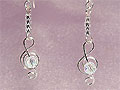 Silver treble clef music note earrings