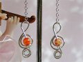 Orange glass bead treble clef music themed earrings